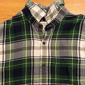 Green and yellow plaid long sleeve shirt.
